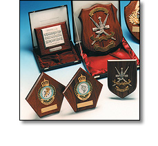 Various wooden shields and plaques